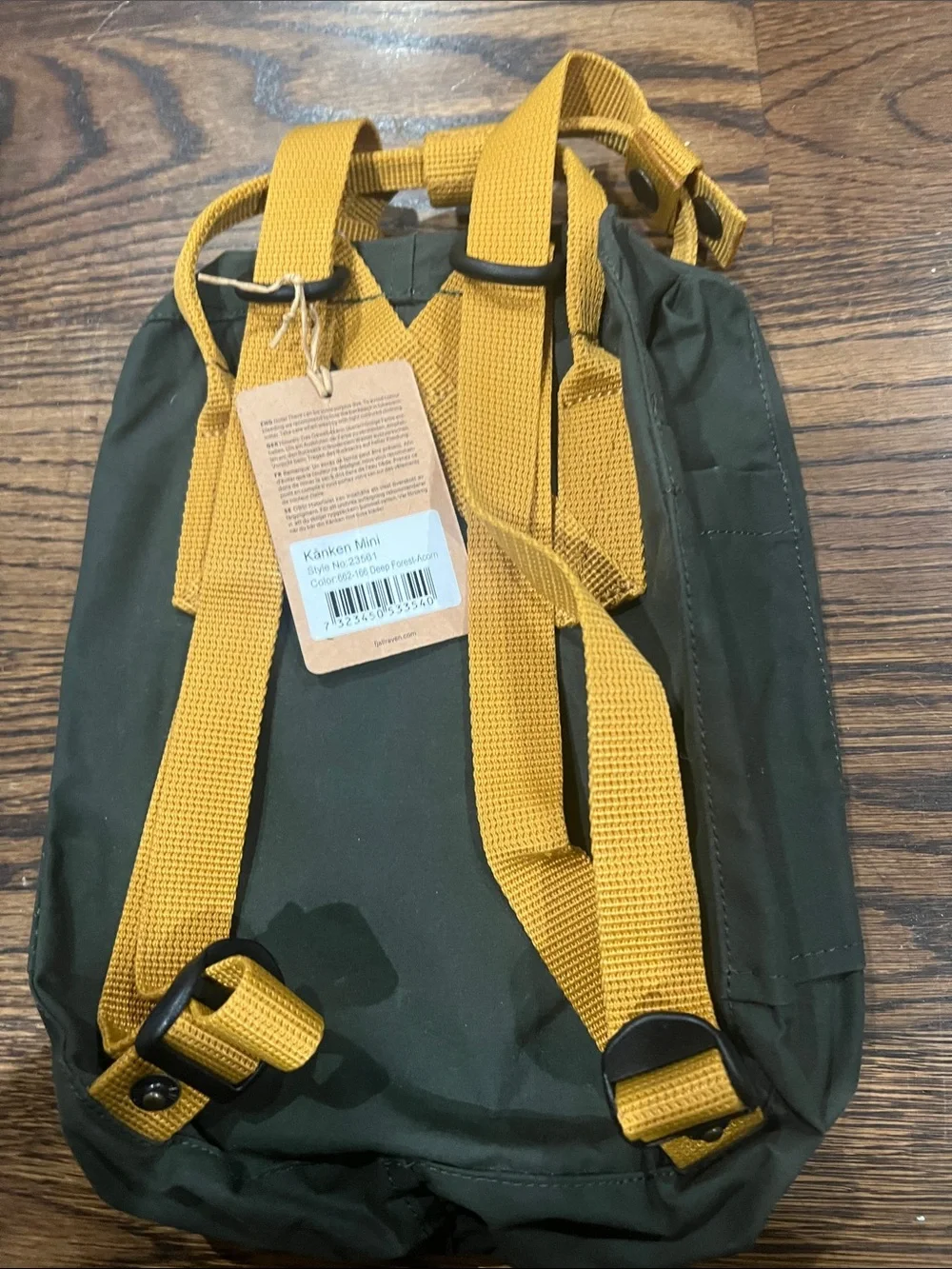 Fjallraven Kanken Mini Backpack in Dark Green with Yellow Straps